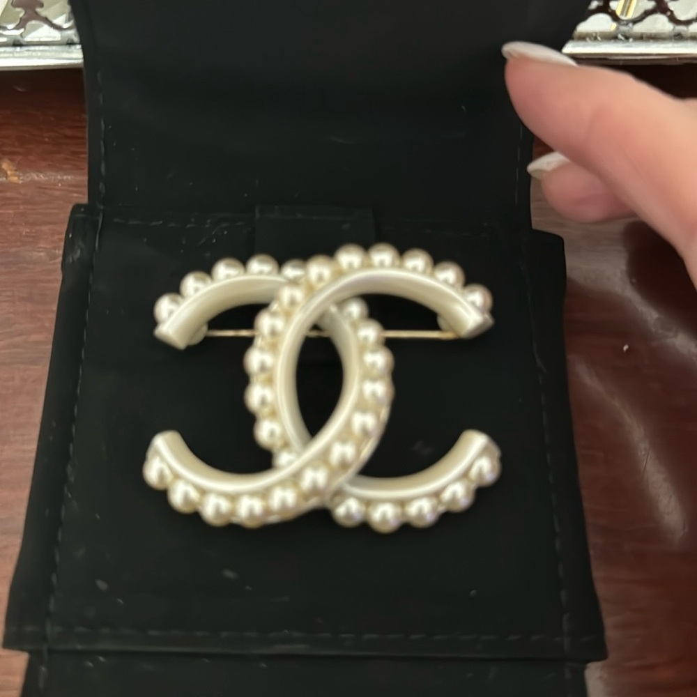 Chanel Brooch.